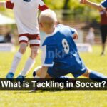 What is Tackling in Soccer